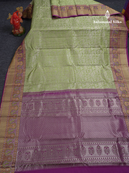 Beautiful Light Elaichi Green Bridal Pure Kanjivaram Silk Saree With Contrast Dark Purple Menakari Work Fancy Border