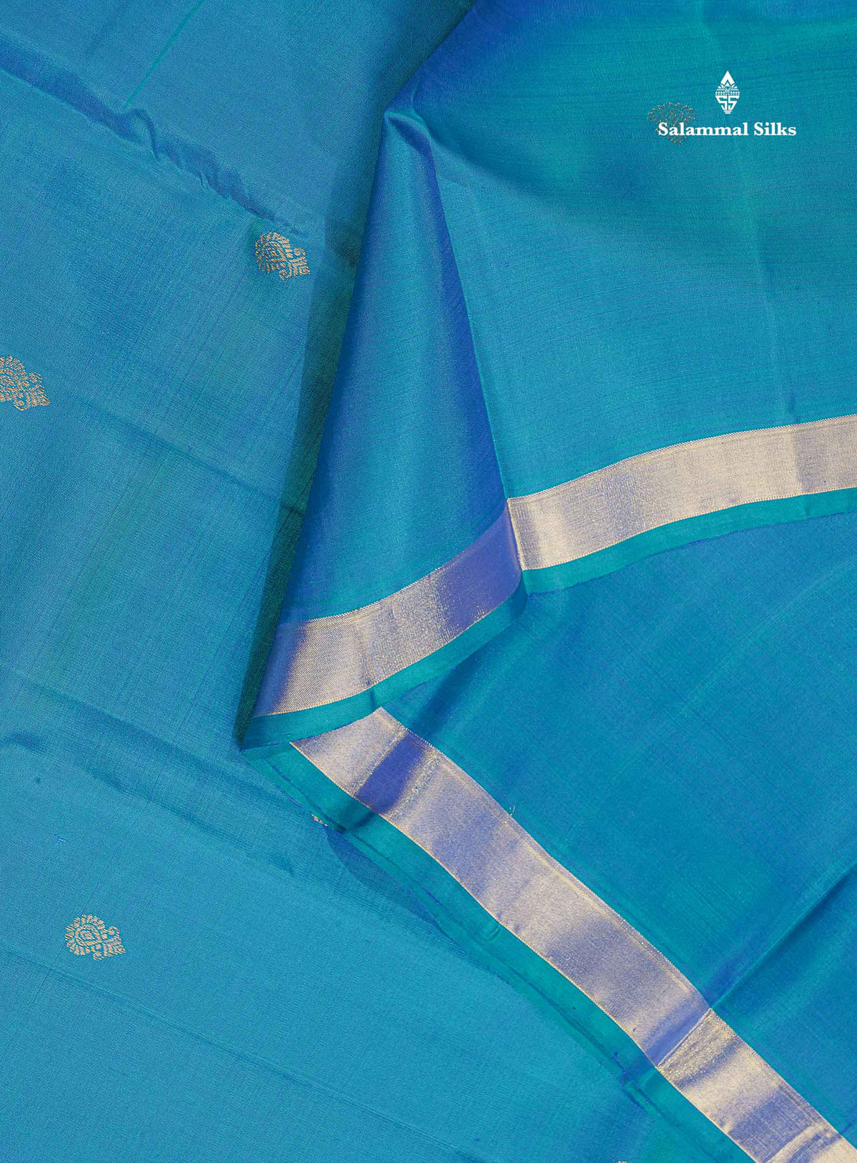 Pure Kanjivaram Silk Saree - Peacock Blue Colour Body With Zari Butta & Traditional Turning Border