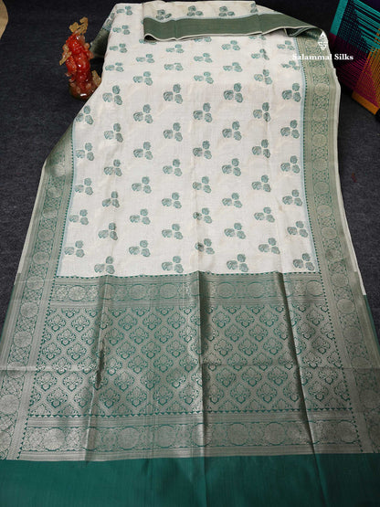 Cotton Mix Saree - Cream Sandal Flower Design Along With Contrast Peacock Green Fancy Border
