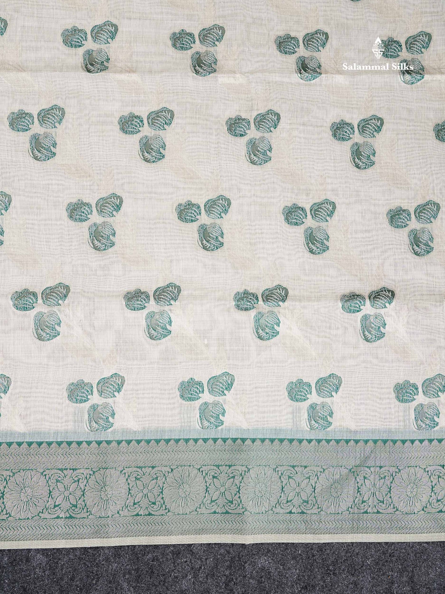 Cotton Mix Saree - Cream Sandal Flower Design Along With Contrast Peacock Green Fancy Border