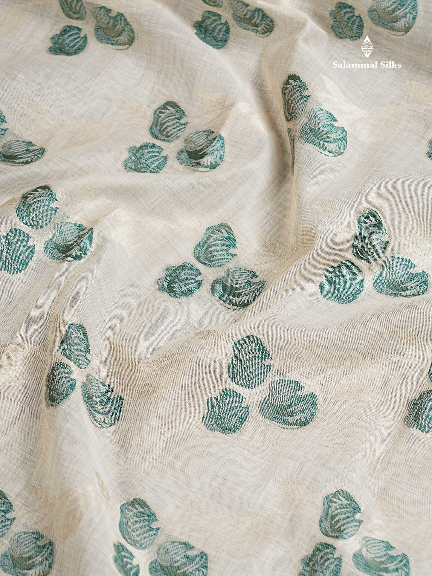 Cotton Mix Saree - Cream Sandal Flower Design Along With Contrast Peacock Green Fancy Border