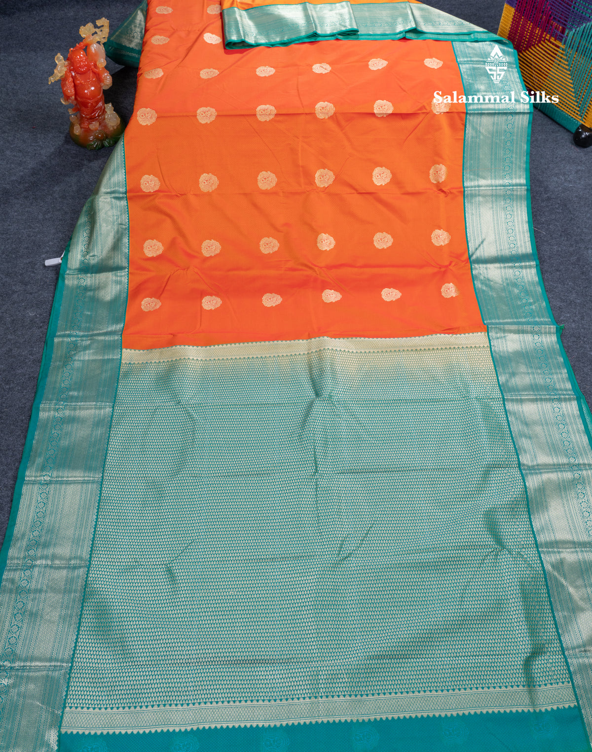 Orange Semi Silk Saree With Contrast Sapphire Green Traditional Border