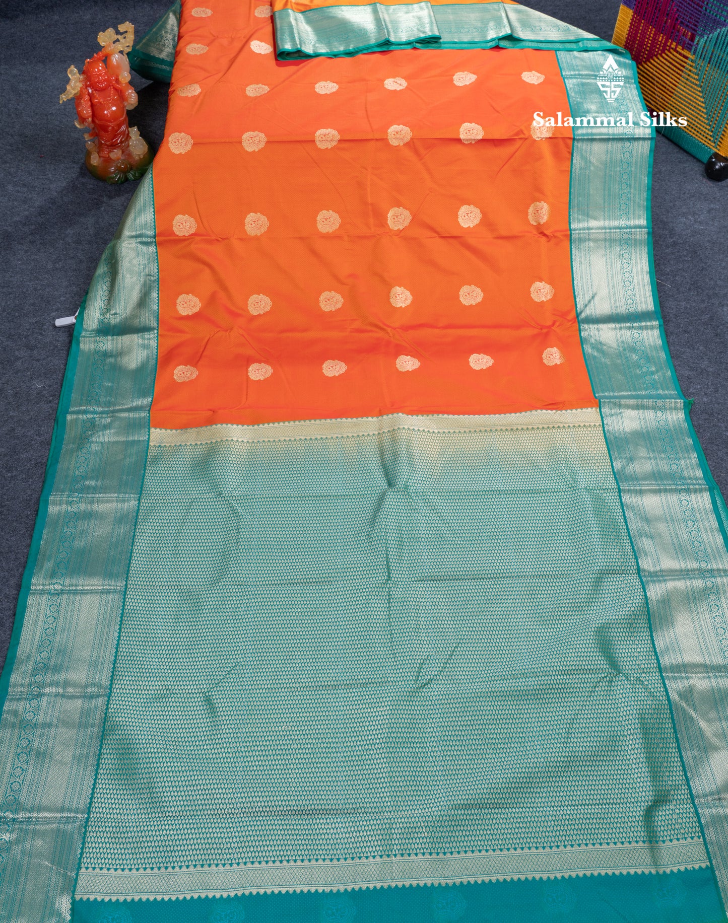 Orange Semi Silk Saree With Contrast Sapphire Green Traditional Border