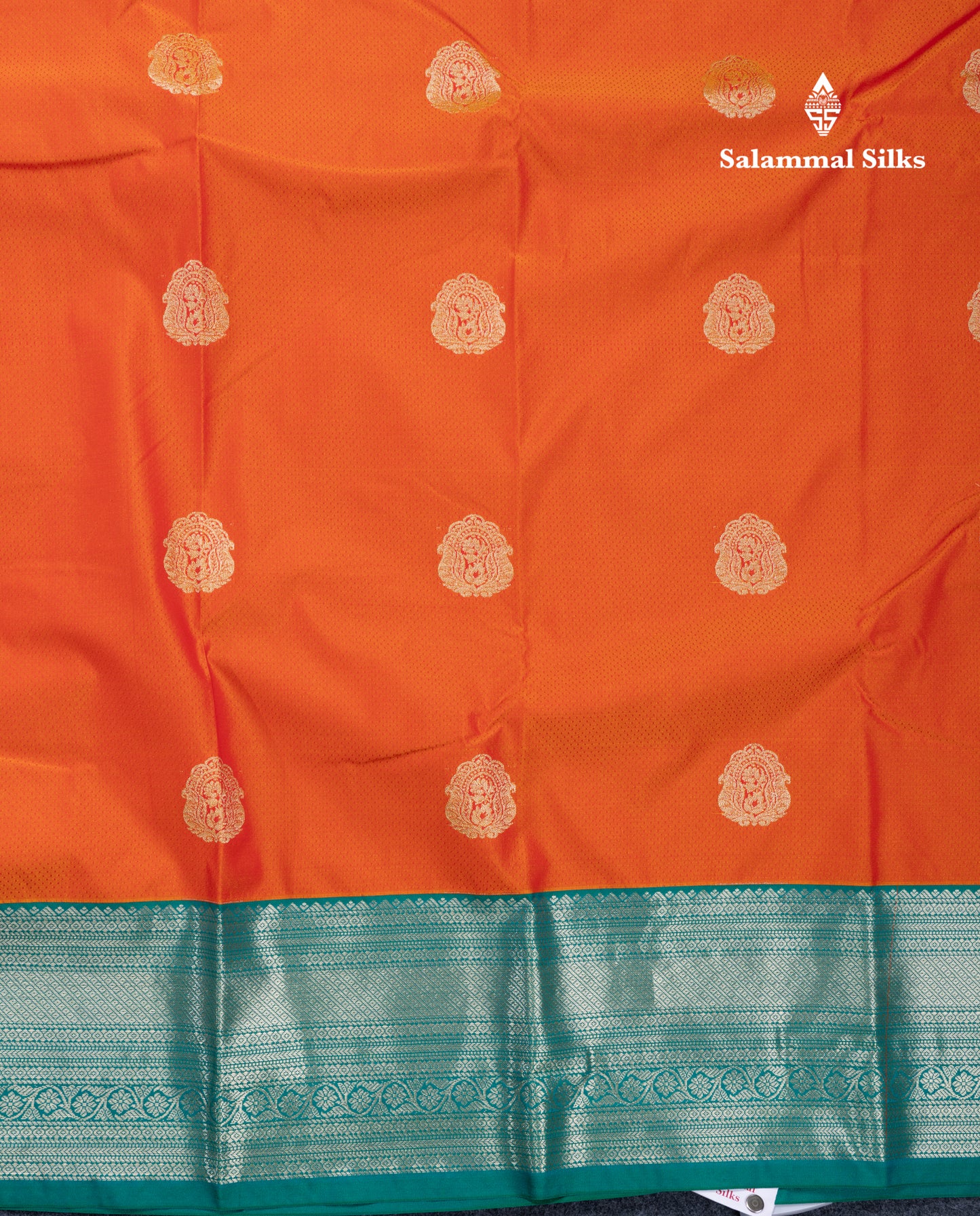 Orange Semi Silk Saree With Contrast Sapphire Green Traditional Border
