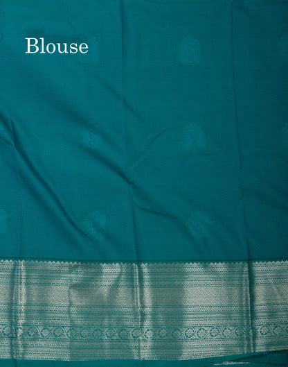 Orange Semi Silk Saree With Contrast Sapphire Green Traditional Border