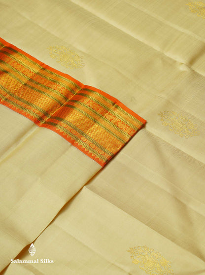 Korvai Beautiful Cream Sandal Pure Kanjivaram Silk Saree With Contrast Orange Traditional Border