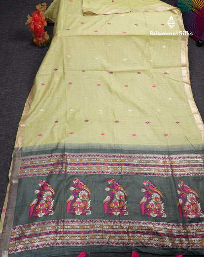 Beautiful Light Green Thread Work Butta Muga Cotton Saree With Contrast Grey Blouse