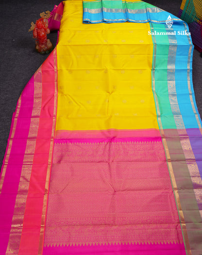Korvai Beautiful Yellow Peacock & Chakaram Buttas Pure Kanjivaram Silk Saree With Traditional Ganga Jamuna Long Border