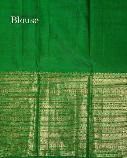 Beautiful Dual Tone Pinkish Orange Pure Kanjivaram Silk Saree With Contrast Green Blouse