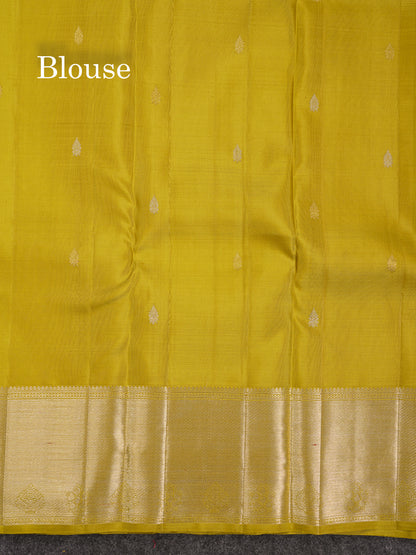 Beautiful Manthulir Yellow Bridal Pure Kanjivaram Silk Saree With Traditional Border