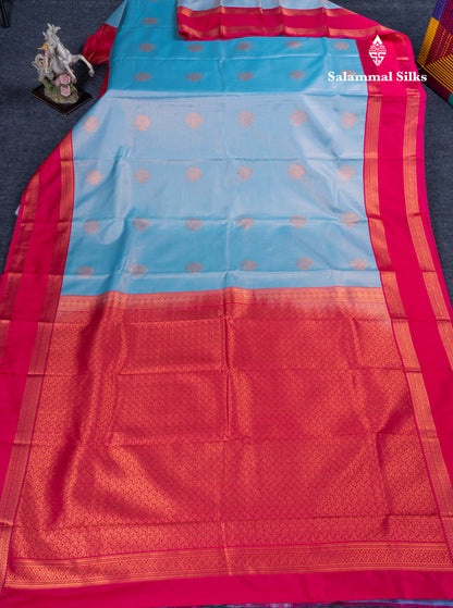 Sky Blue Tiny Zari Checks With Butta Semi Silk Saree With Contrast Pink Rettapet Border