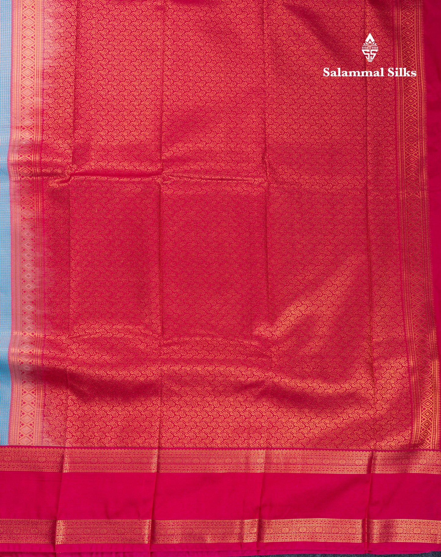 Sky Blue Tiny Zari Checks With Butta Semi Silk Saree With Contrast Pink Rettapet Border