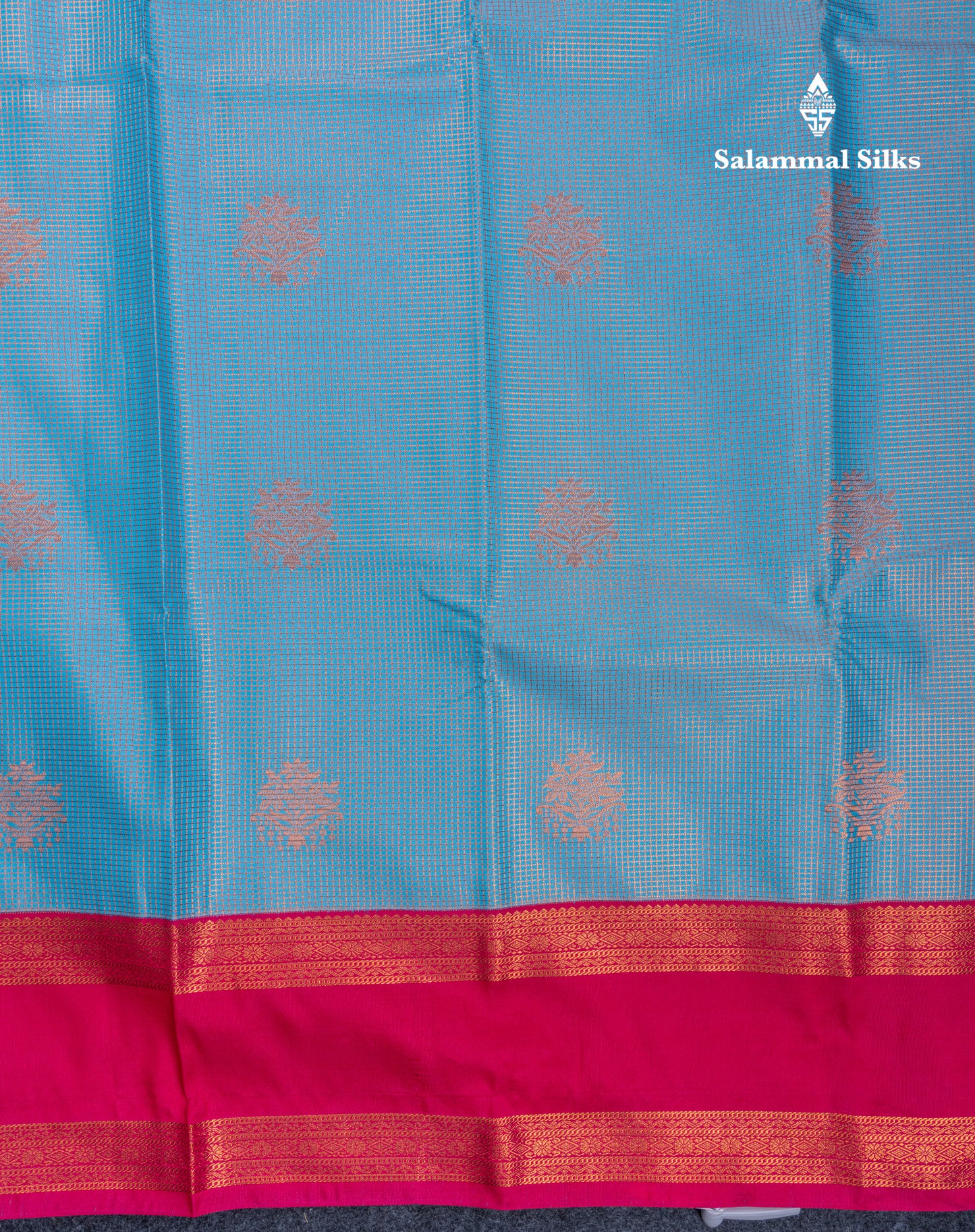 Sky Blue Tiny Zari Checks With Butta Semi Silk Saree With Contrast Pink Rettapet Border