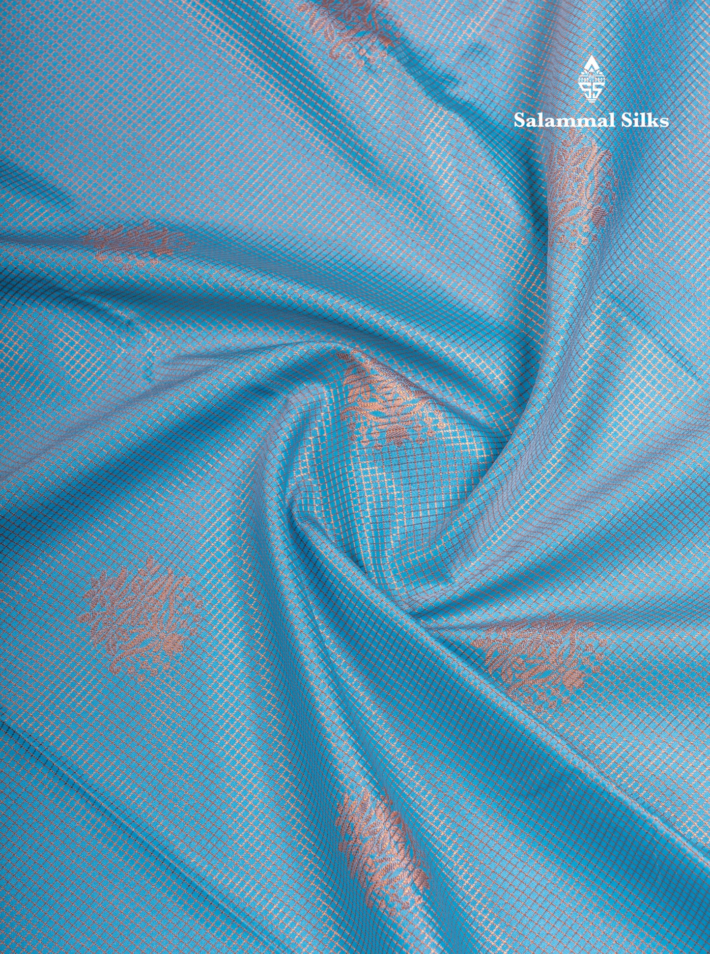 Sky Blue Tiny Zari Checks With Butta Semi Silk Saree With Contrast Pink Rettapet Border