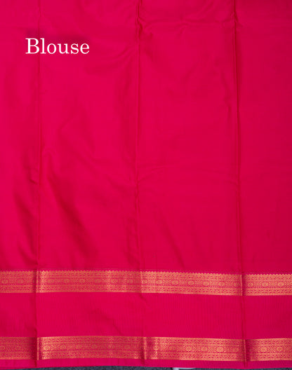 Sky Blue Tiny Zari Checks With Butta Semi Silk Saree With Contrast Pink Rettapet Border