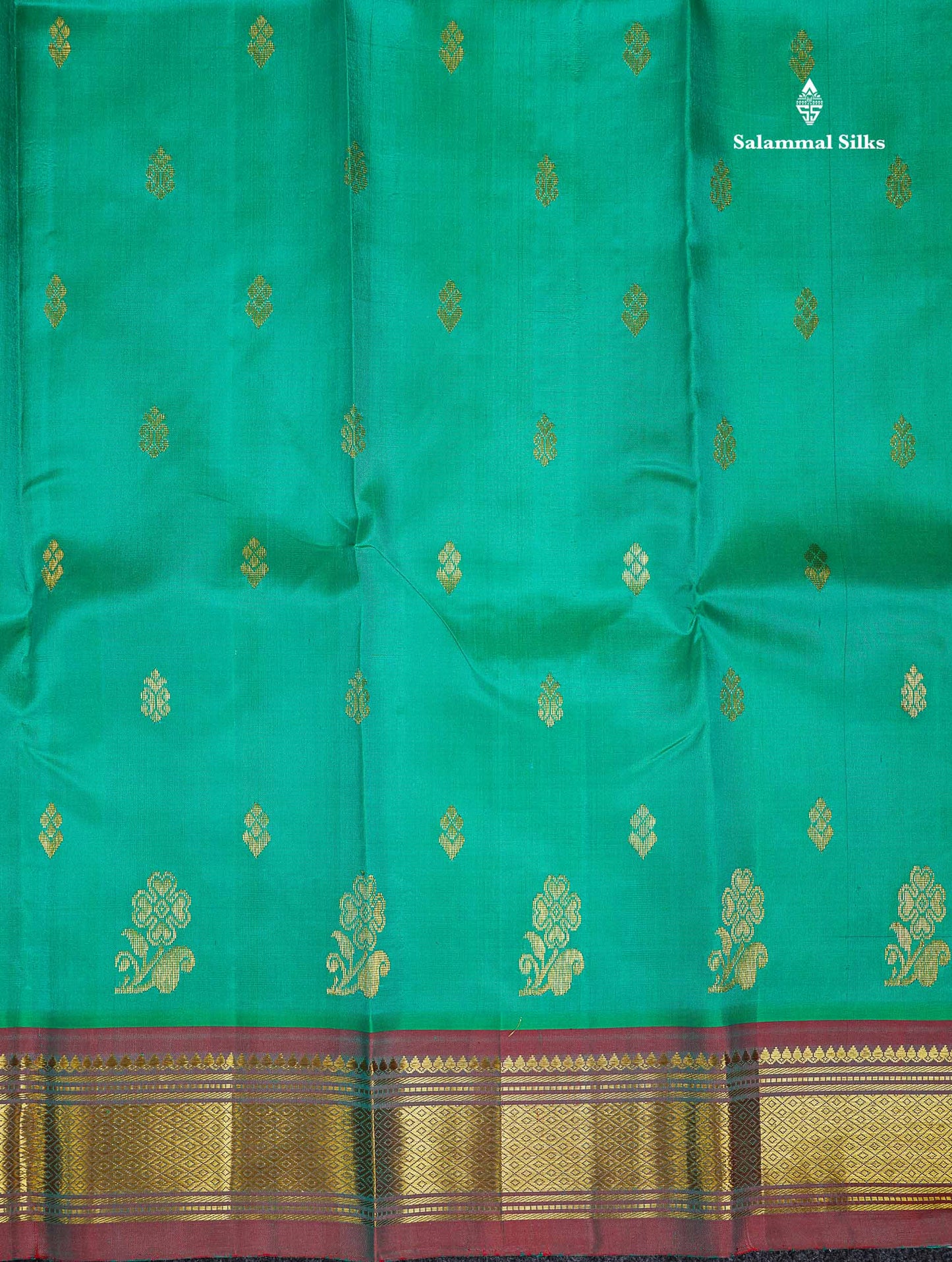 One Side Border Pure Silk Saree - Sapphire Green Zari Butta With Contrast Tomato Red Traditional Border