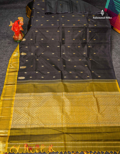 One Side Border Pure Silk Saree - Black Zari Butta With Contrast Manthulir Yellow Traditional Border