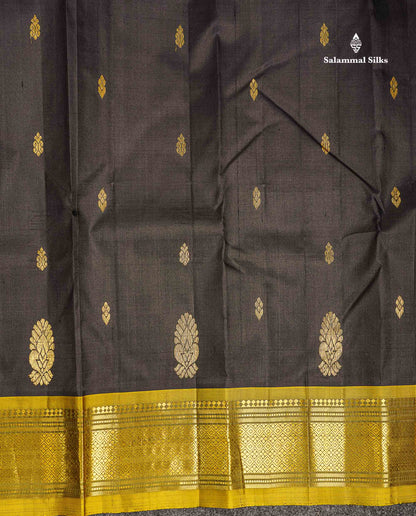 One Side Border Pure Silk Saree - Black Zari Butta With Contrast Manthulir Yellow Traditional Border