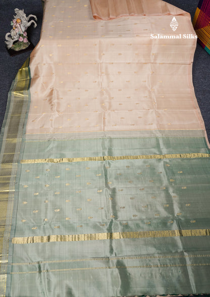 Beige Pure Kanjivaram Silk Saree With Contrast Light Green One Side Border