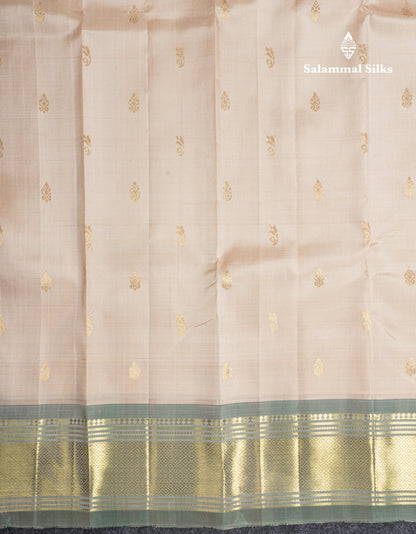 Beige Pure Kanjivaram Silk Saree With Contrast Light Green One Side Border