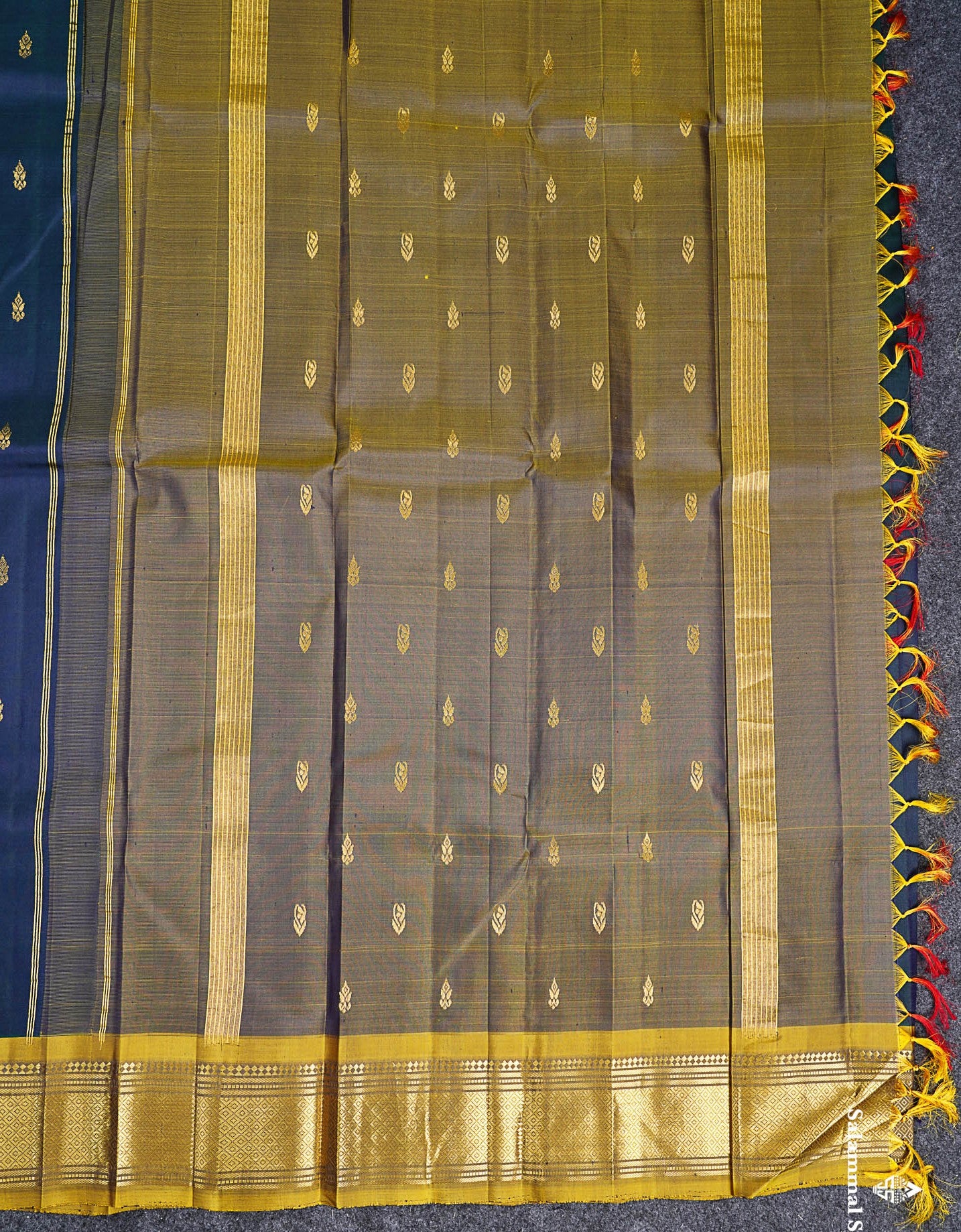 One Side Border Pure Silk Saree - Dual Tone Peacock Blue Zari Butta With Contrast Manthulir Yellow Traditional Border