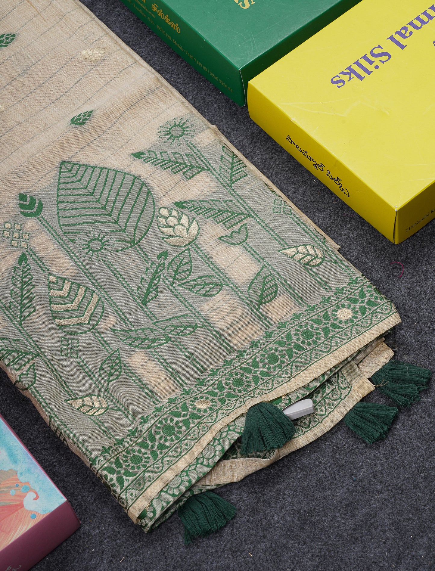 Beautiful Cream Sandal Thread Work Butta Muga Cotton Saree With Contrast Bottle Green Border