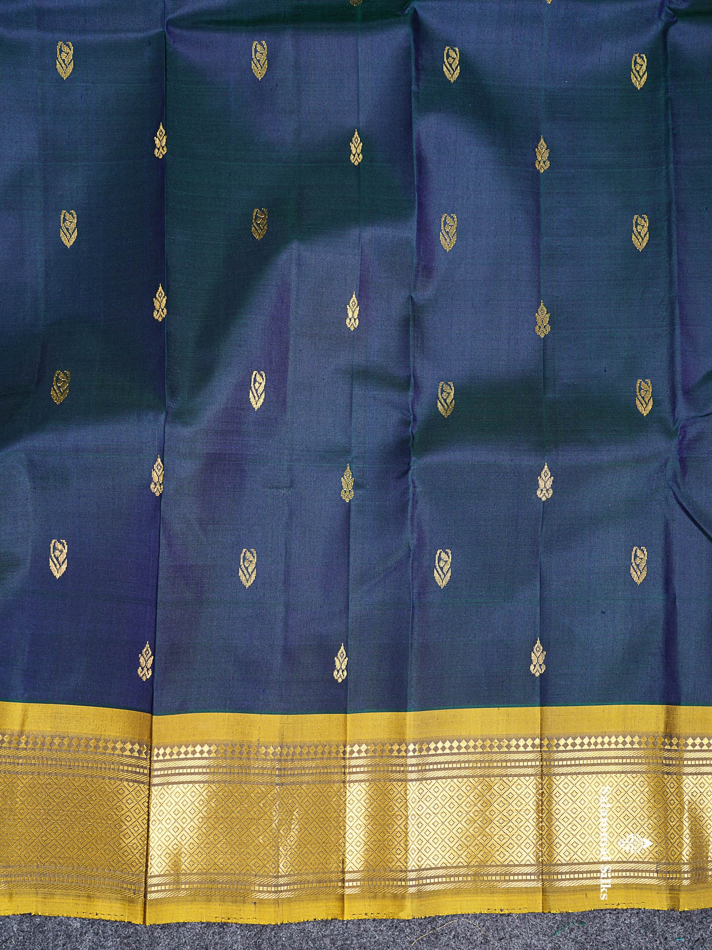 One Side Border Pure Silk Saree - Dual Tone Peacock Blue Zari Butta With Contrast Manthulir Yellow Traditional Border