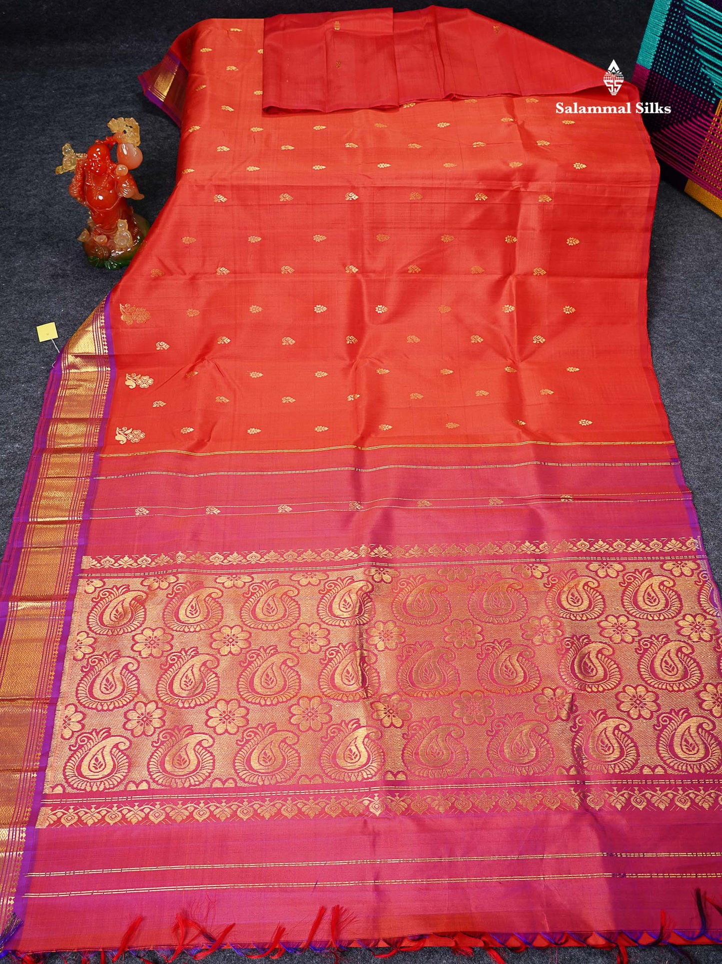 One Side Border Pure Silk Saree - Dual Tone Orange Zari Butta With Contrast Purple Traditional Border
