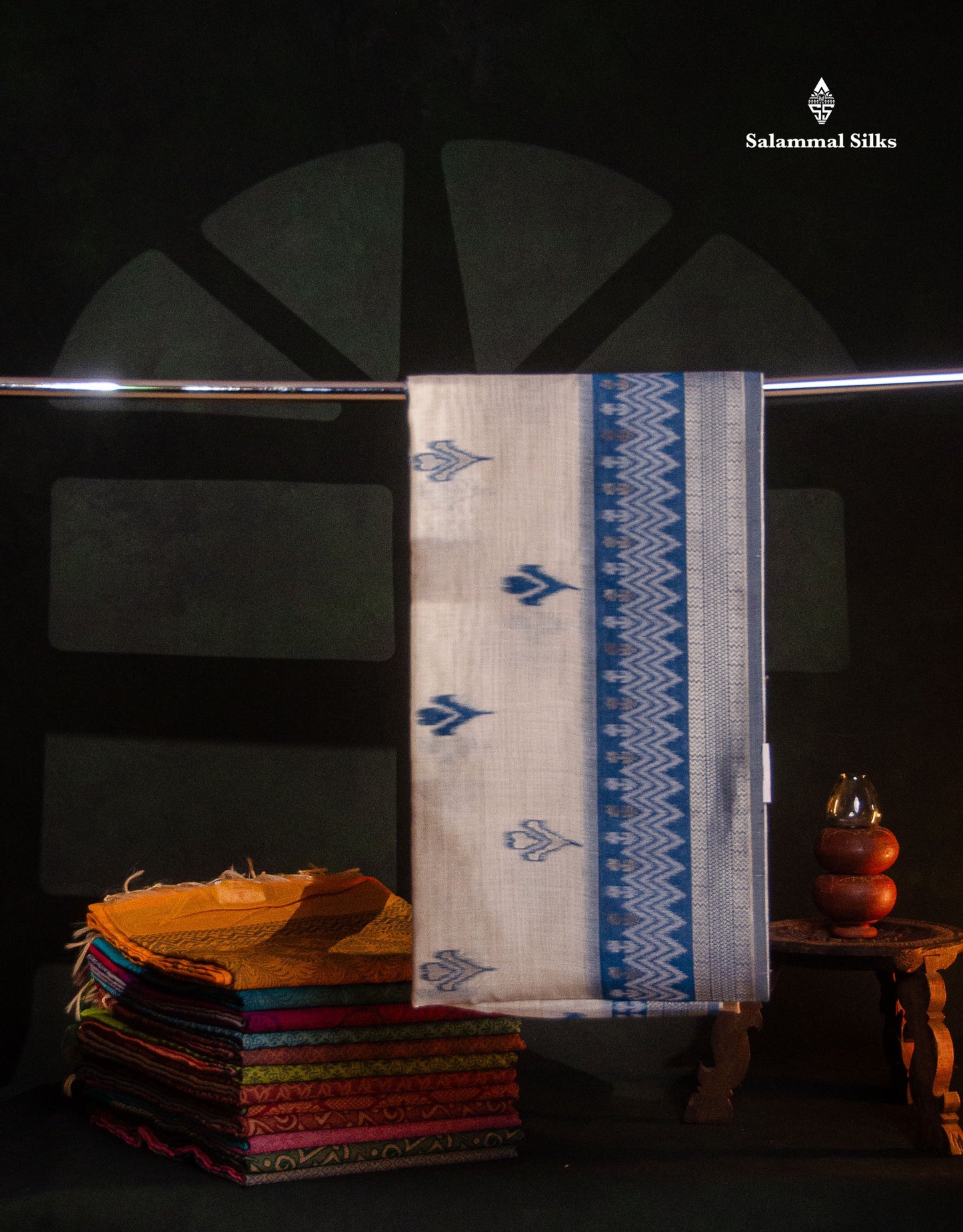 Elegant Cream Sandal Ikkat Style Cotton Mix Saree With Contrast Peacock Blue Border