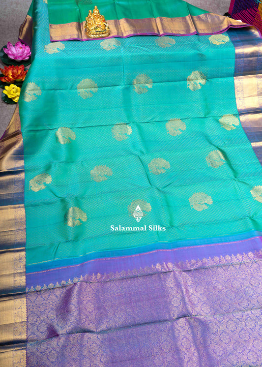 Kanjivaram Sapphire Green Pure Silk Jacquard Saree With Purple Blouse