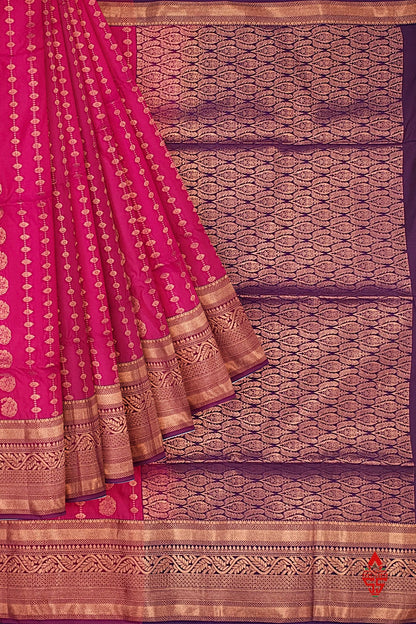 Reddish Pink Semi Soft Silk Saree With Violet Blouse