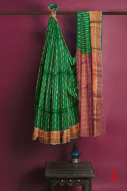 Green Semi Soft Silk Saree With Baby Violet Blouse