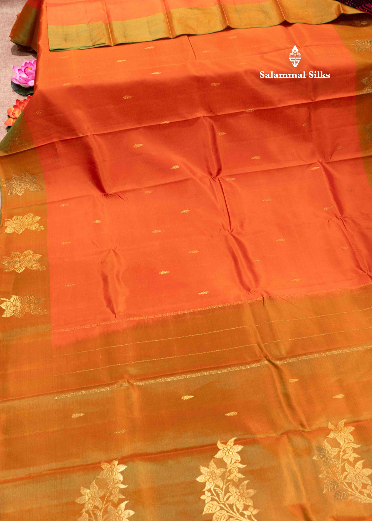 Orange Shade Pure Kanjivaram Silk Saree With Fancy Green Border