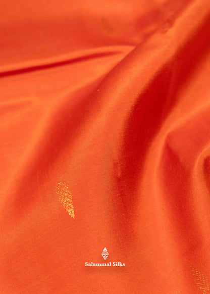 Orange Shade Pure Kanjivaram Silk Saree With Fancy Green Border