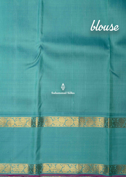 Kanjivaram Black Pure Silk Saree With Sapphire Green Double Border