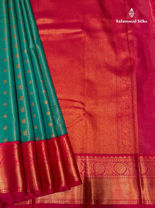 Vairaoosi Sapphire Green Semi Silk Saree With Pink Border