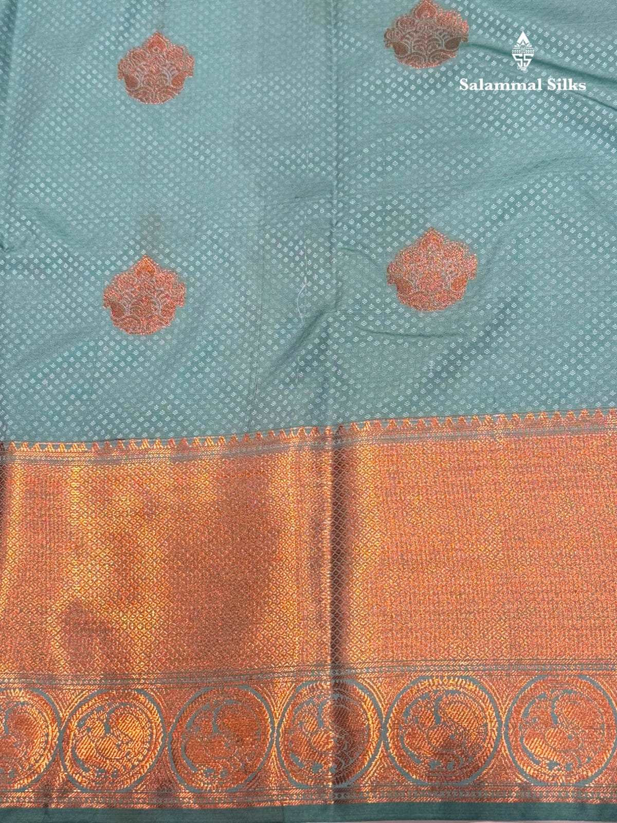 Embose Butta Light Ananda Semi Silk Saree With Copper Border
