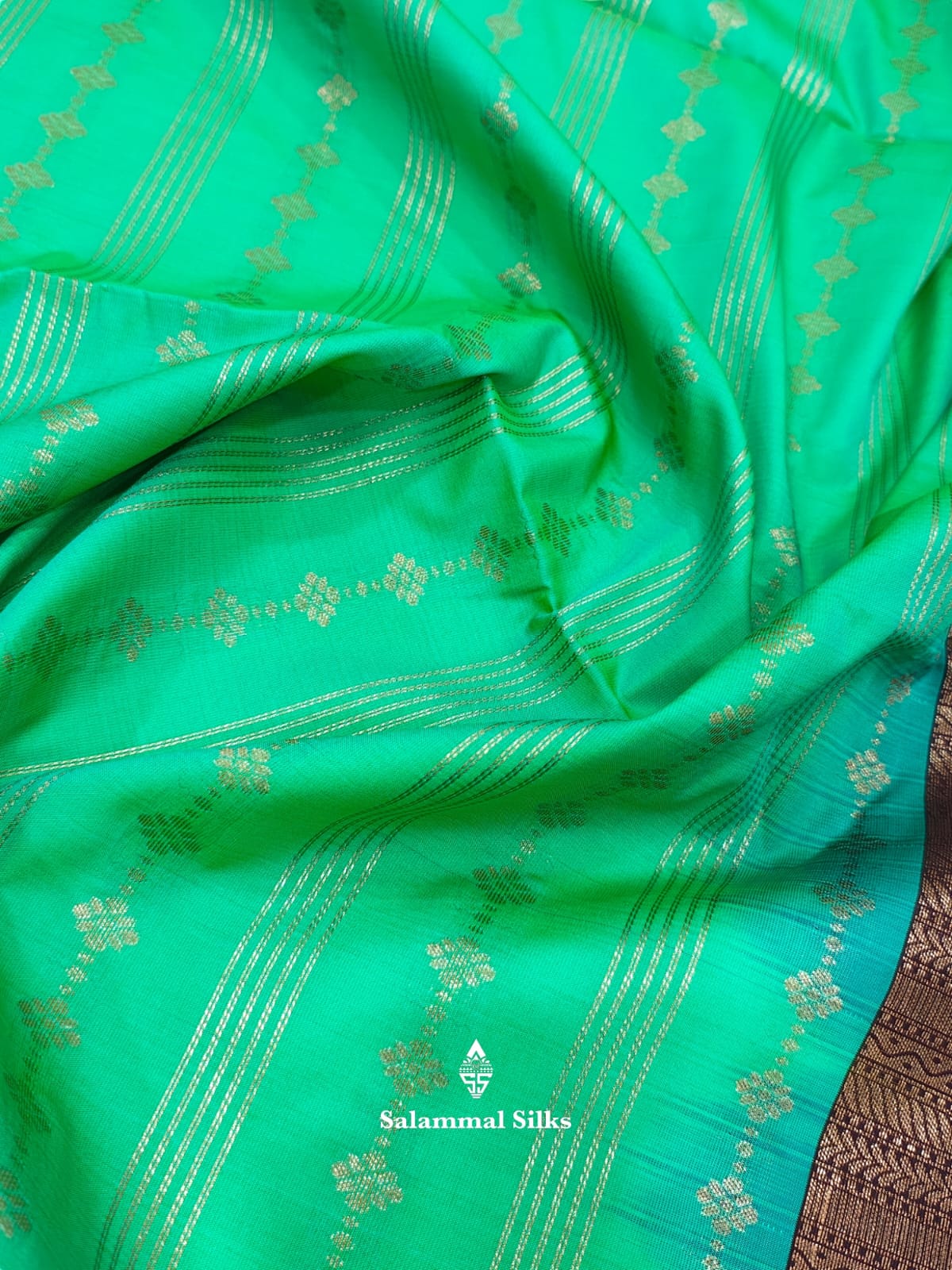 Sapphire Green Semi Soft Silk Saree With Copper Border